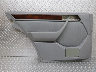 W124 rear left door card grey used OEM