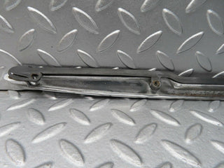 R107 SLC trunk chrome handle moulding used OEM
