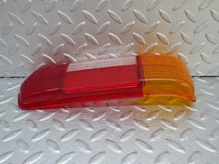 W109 tail light lens left side used OEM