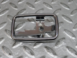 W123 chrome frame for door opener right used OEM