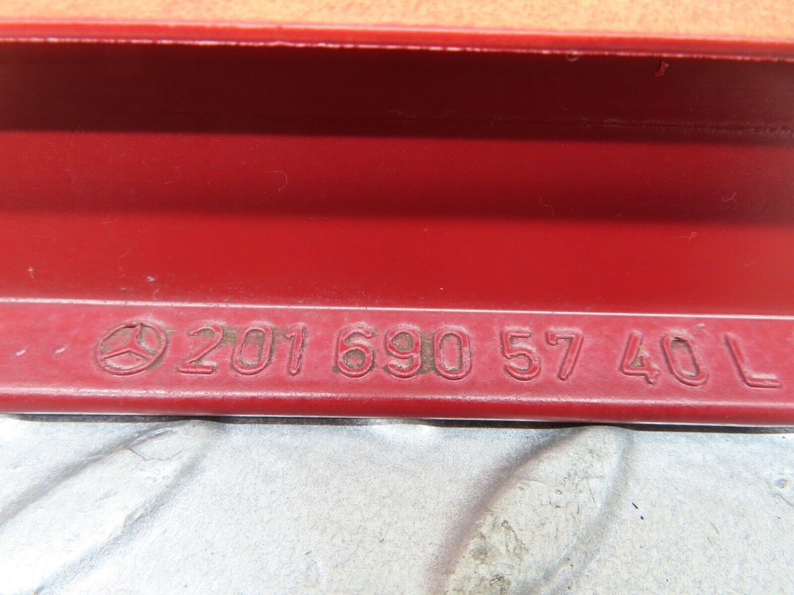 14631 Mercedes-Benz W201 190E Rear Left Door Moulding Trim Red 2016905740