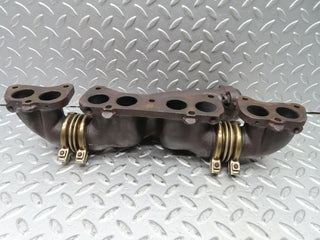 W140 Coupe exhaust manifold left used OEM