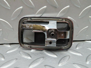 W123 chrome frame for door opener right used OEM