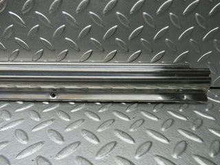 R107 SLC left door sill chrome used OEM