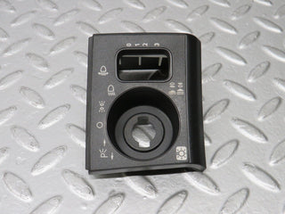 R129 SL headlight switch surround used OEM