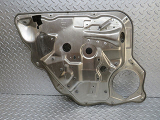 W221 rear right window regulator support panel used OEM
