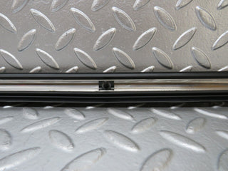 W123 front right door lower moulding trim used OEM