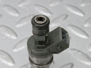 W124 Cabriolet fuel injector used OEM