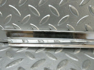 R107 SLC rear right window chrome used OEM