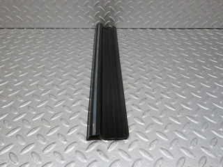 W123 rear right door sill trim black used OEM