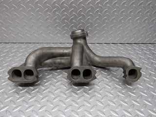 W123 exhaust manifold used OEM