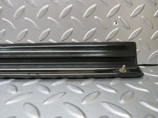 W123 front left door lower moulding trim used OEM