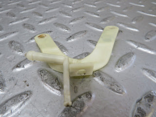 R129 SL front right headlight wiper bracket used OEM