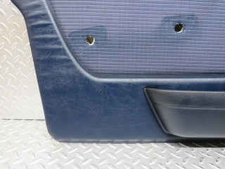 W123 front left door card blue used OEM