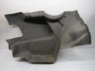 W124 trunk panel cover left used OEM