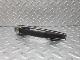 W123 front left door exterior handle used OEM