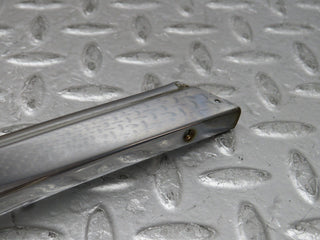 W109 rear left door chrome window frame used OEM