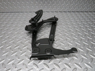 W124 bonnet hinge left side used OEM