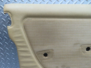 W123 front left door card beige used OEM