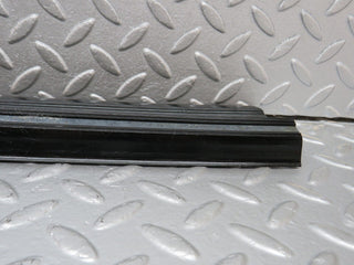 W123 front left door sill trim black used OEM