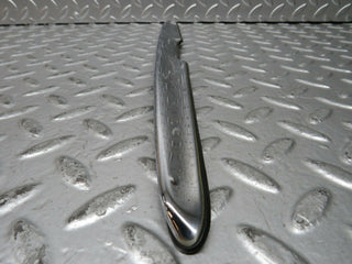 R107 SLC trunk chrome handle used OEM