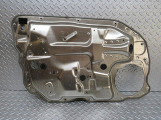 W221 front right window regulator support panel used OEM