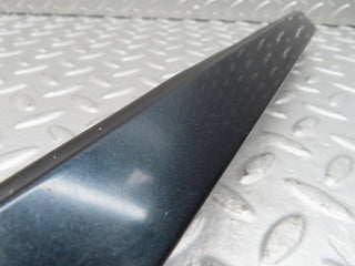 W140 headlight lower trim left side used OEM
