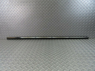 W123 front left door lower trim new OEM