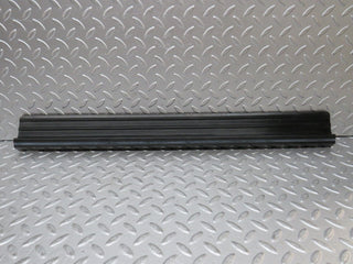 W123 front left door sill trim black used OEM