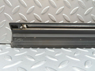 W123 Wagon rear left door lower trim used OEM