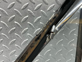 W108 front left quarter window used OEM