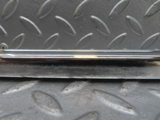 W123 rear left chrome window channel used OEM