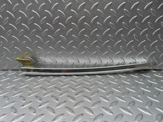 W123 rear left door chrome window channel used OEM