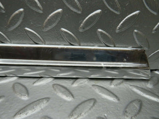 R107 SLC rear left window chrome trim used OEM