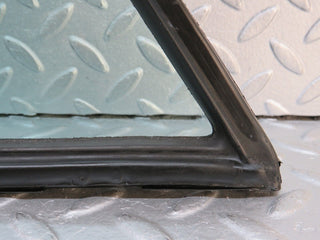 W109 rear left quarter window glass used OEM