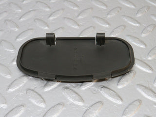 R129 SL washer nozzle cover used OEM