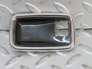 W123 chrome frame for door opener left used OEM