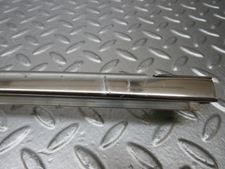 W123 rear left chrome window channel used OEM