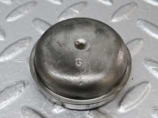 W124 wheel hub locking cap used OEM
