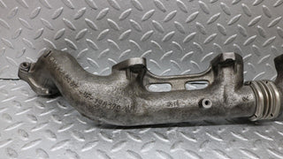 W126 Coupe exhaust manifold right used OEM