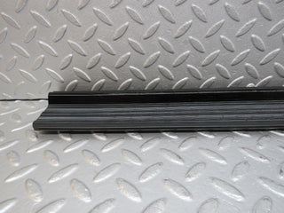 W123 front left door sill trim black used OEM