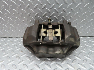 W140 front brake caliper left side used OEM