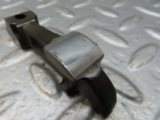 W123 valve rocker arm with retaining spring used OEM