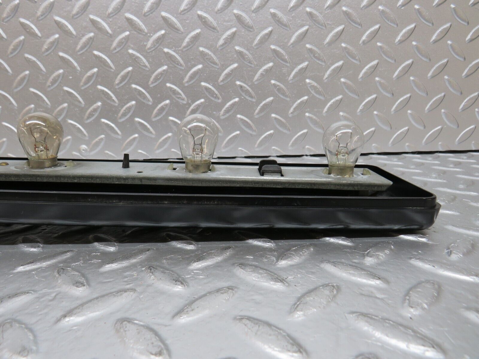 31054 Mercedes-Benz W123 200D Tail Light Bulb Holder Left Side 22064L
