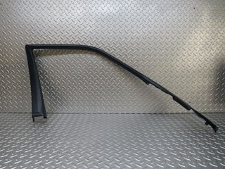 W140 front left door window trim used OEM