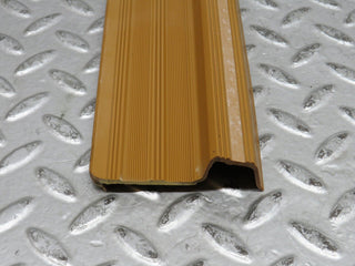W123 rear left door sill trim palomino used OEM