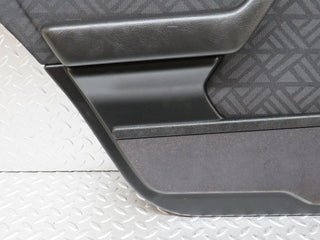 W202 rear left door card used OEM