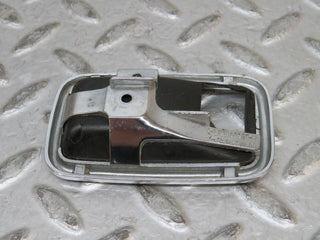 W123 chrome frame for door opener right used OEM