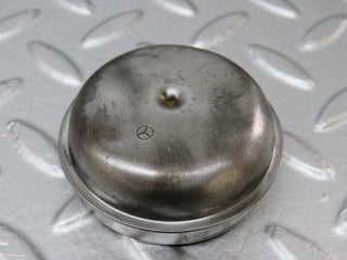 W124 wheel hub locking cap used OEM
