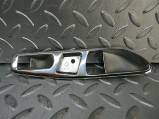 R107 SLC door handle chrome surround left side used OEM